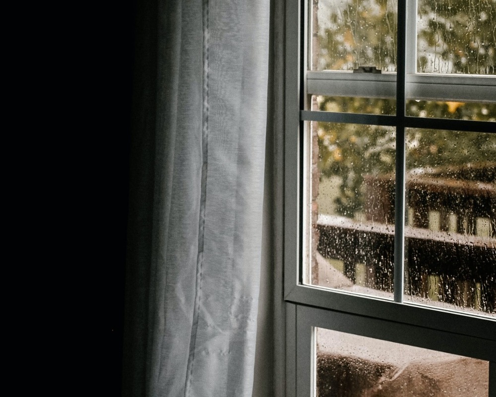 rainy-window-from-dark-room