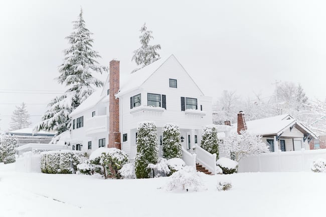 white-house-black-shutters-winter-snow