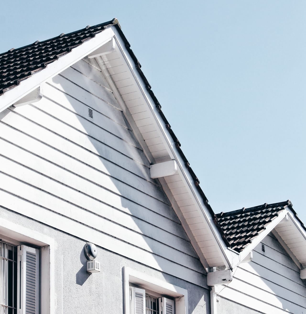 white-house-with-shingle-roof