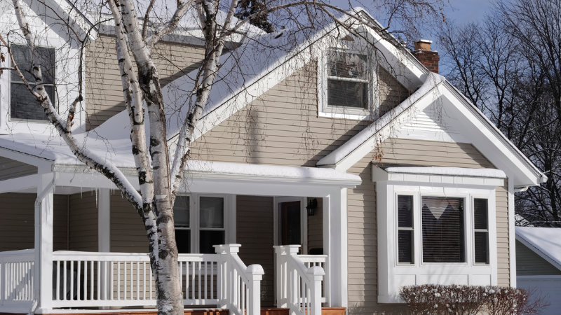 Home in winter with snow