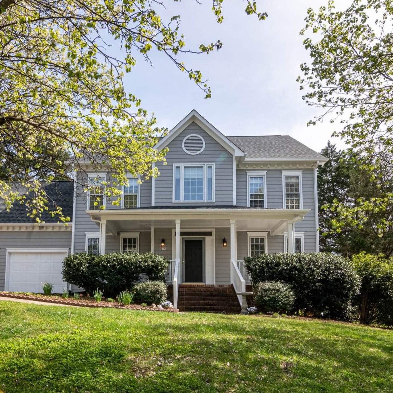 light-gray-house-on-a-bright-spring-day